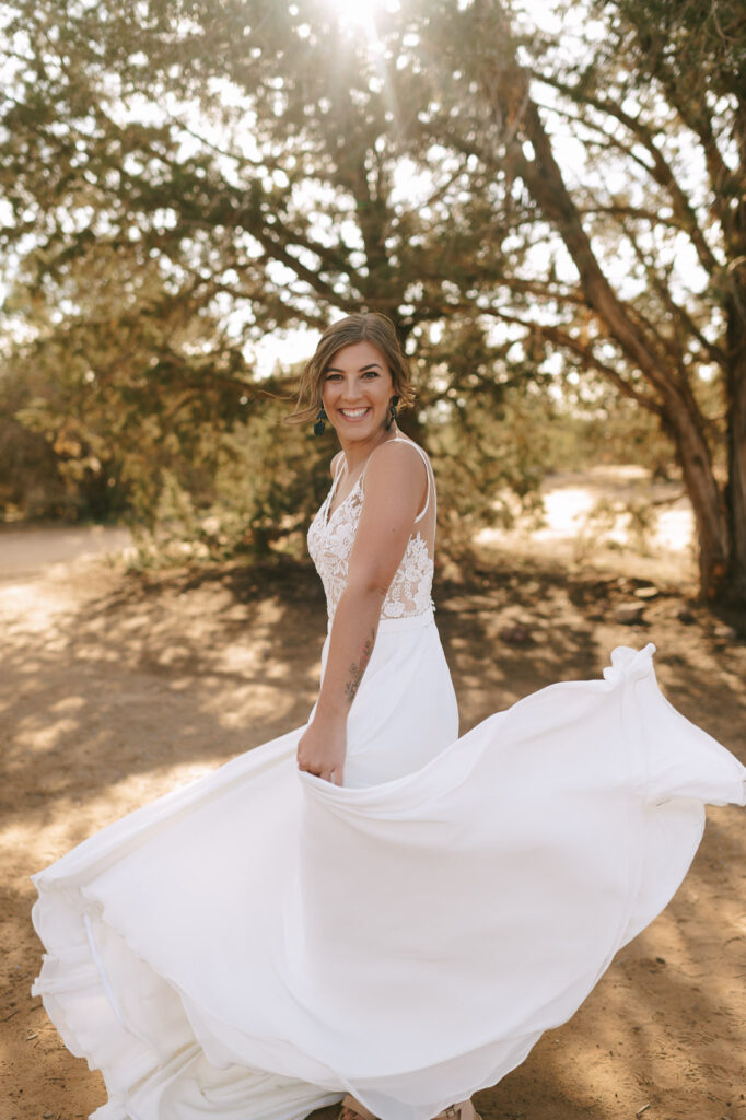 Nicole twirls for her bridal portraits before she heads down the aisle for her  Zion National Park elopement