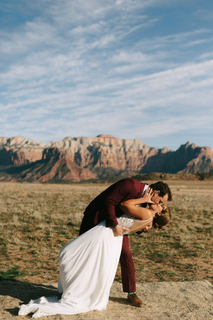 Nicole and Kaleb seal their wedding with a kiss during their Zion National Park elopement