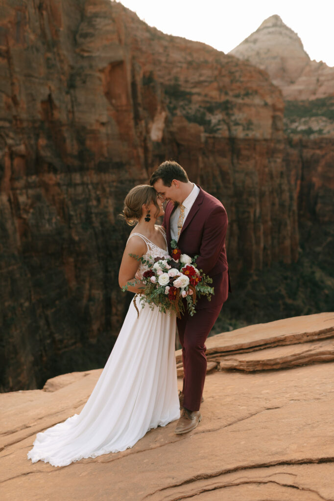 Couple touches foreheads at Zion National Park