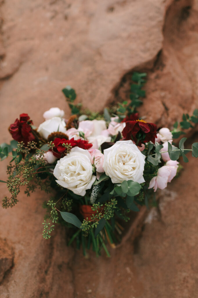 Florals sit on a rock at Zion National Park 