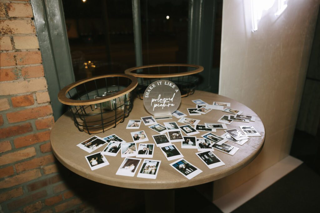 Polaroids lay on the table