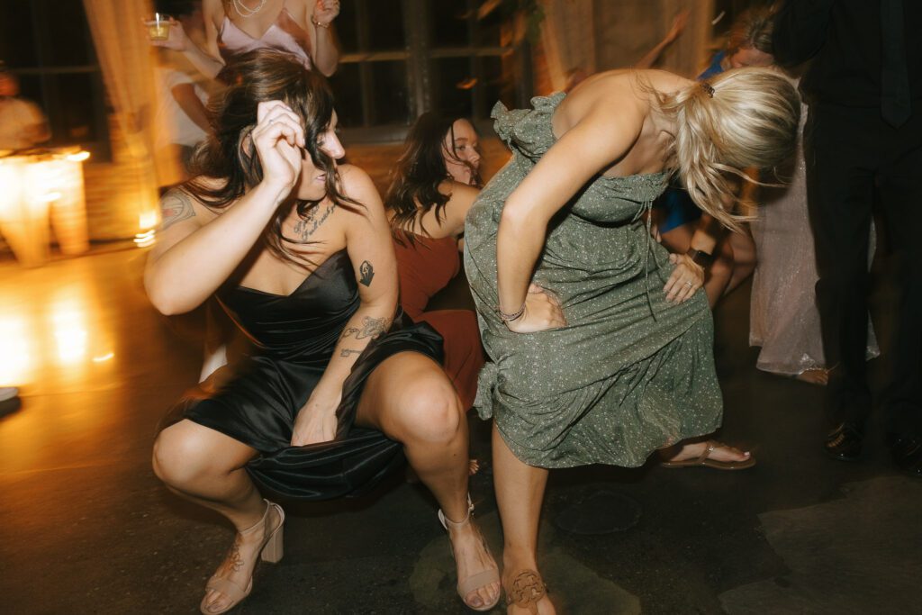 A group of girls drop it low on the dance floor
