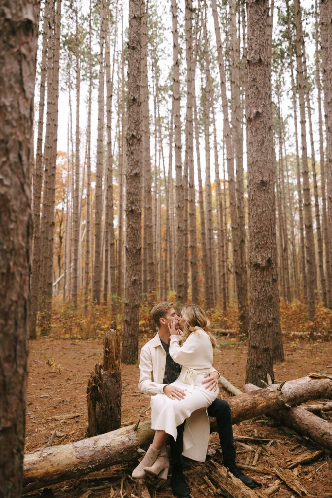 Sophia and Brad embrace in oak grove 