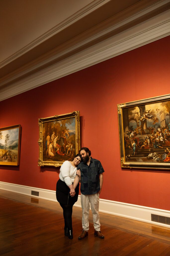 Adam and Bethany stand in the great gallery