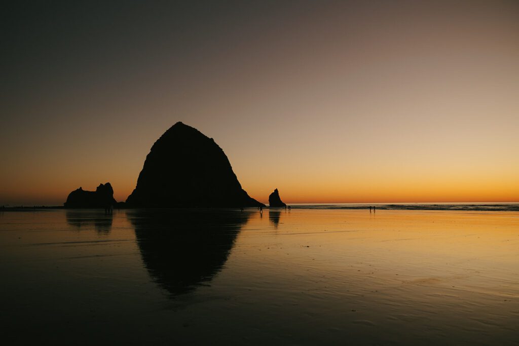 A view of Haystack Rock on Cannon Beach in Oregon at Sunset