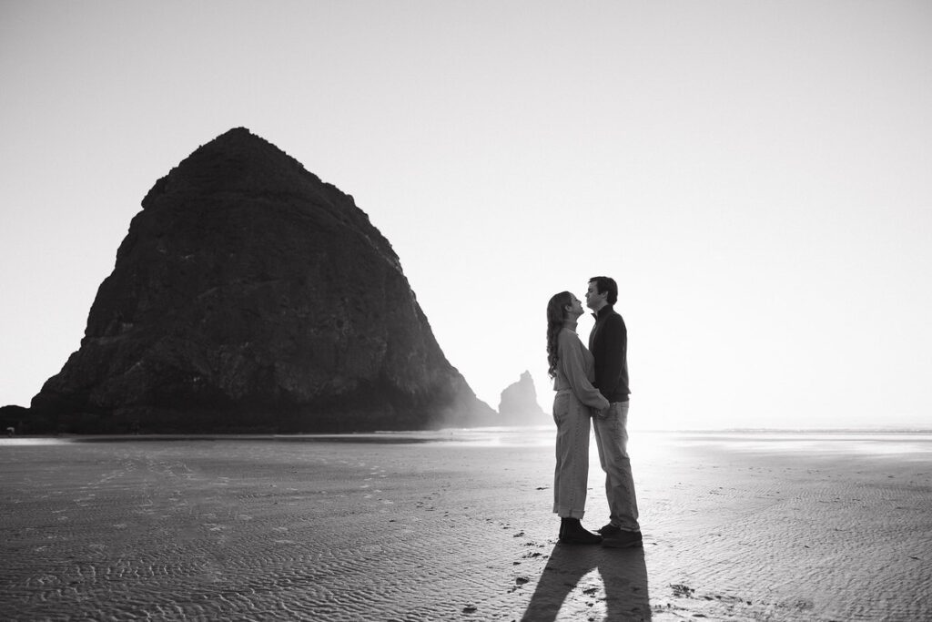 J&L embrace on the beach