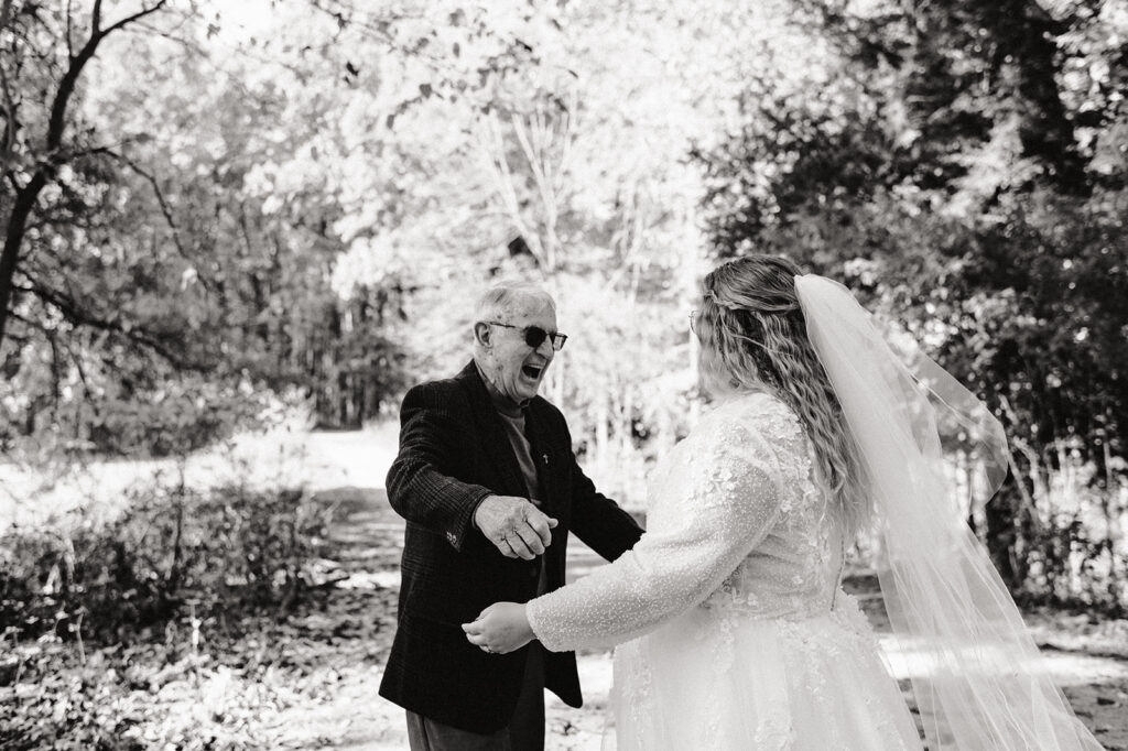 Amy's grandpa goes to hug her during their first look