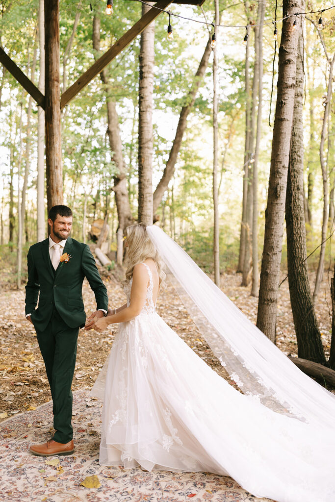 Groom turns to see his bride during first look