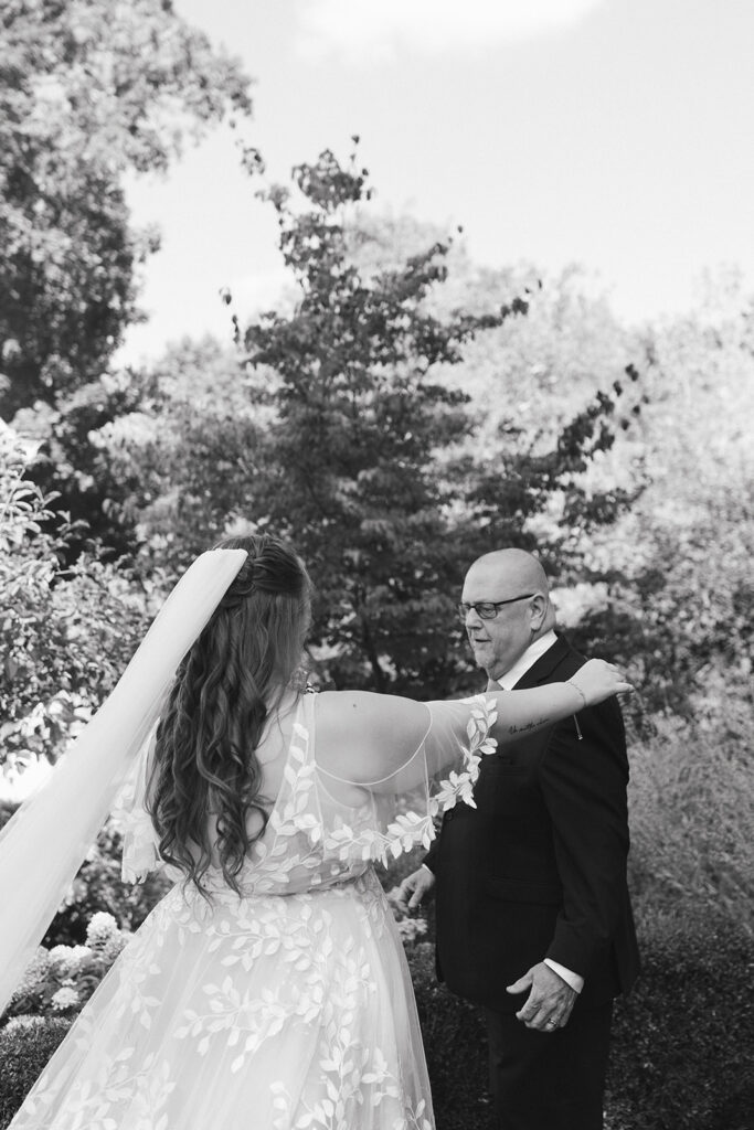 Katy goes to hug her dad during her parent first look