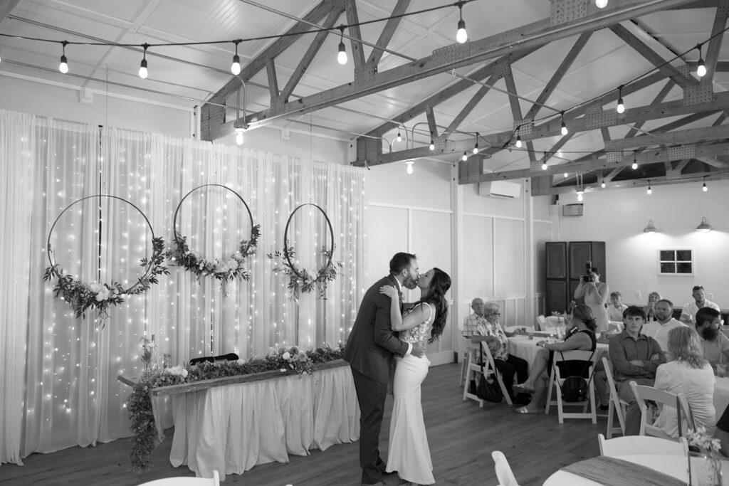 Karis and Tony dance during their first dance at their wedding reception at Bloom and Bower, an Ohio wedding venue