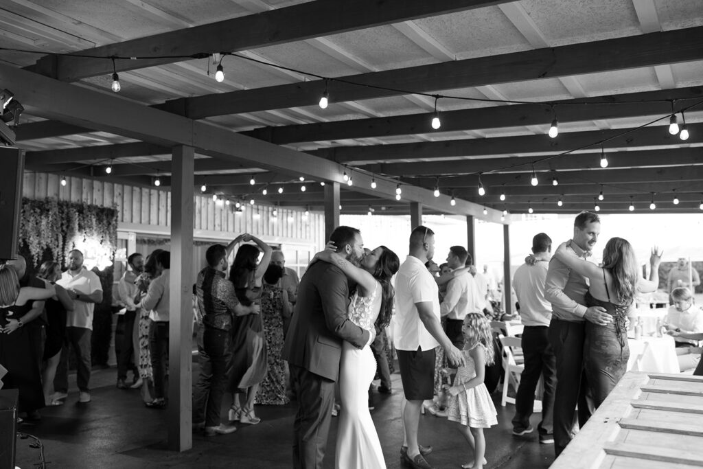 Karis and Tony dance at their wedding reception at Bloom and Bower