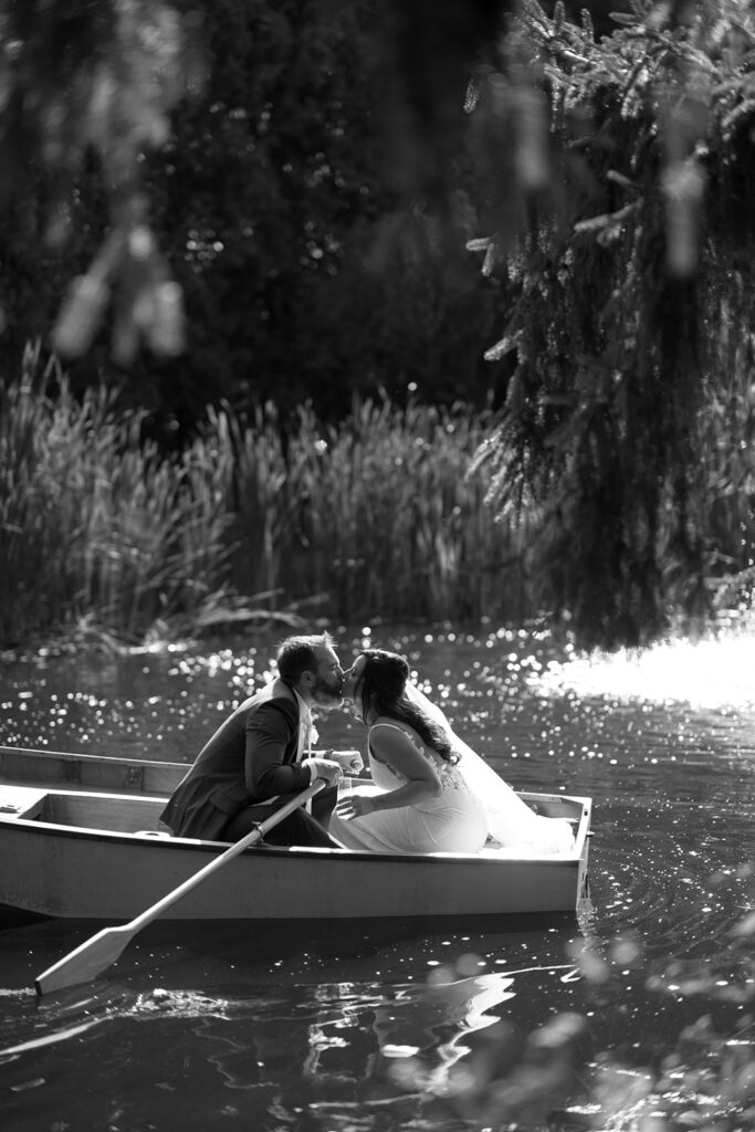 Karis and Tony share a kiss during their canoe ride around the lake at Bloom and Bower, a northwest ohio wedding venue