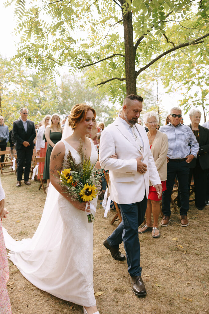 Bride walking down the aisle to groom with no first look