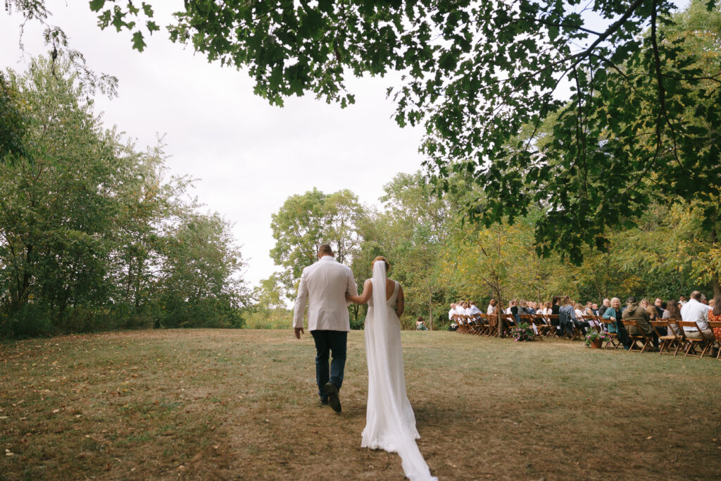 Bride walking towards aisle 