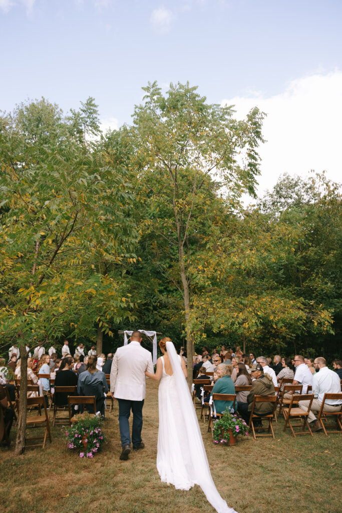 Bride walking down the aisle with her father