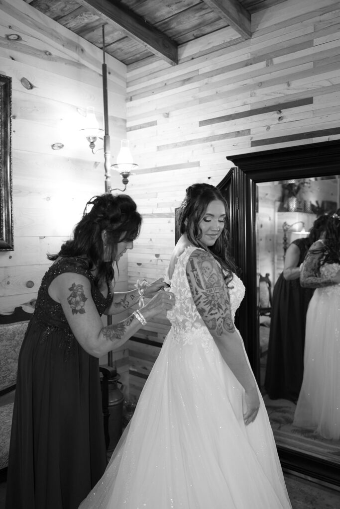 Bride getting ready at the same location as groom