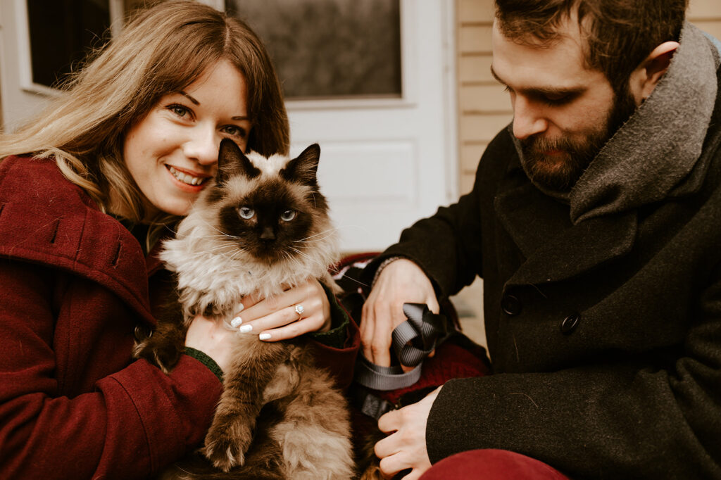 Including your dog in engagement photos on the front porch with a relaxed, candid moment