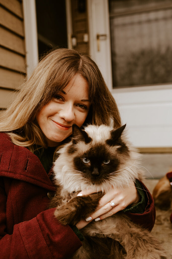 Woman with her cat at engagement session
