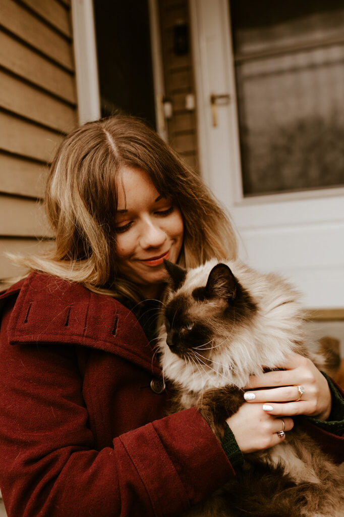 Woman with her cat at engagement session