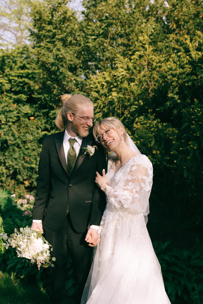 Bride resting her head on the groom’s shoulder while they talk through prewedding nerves


