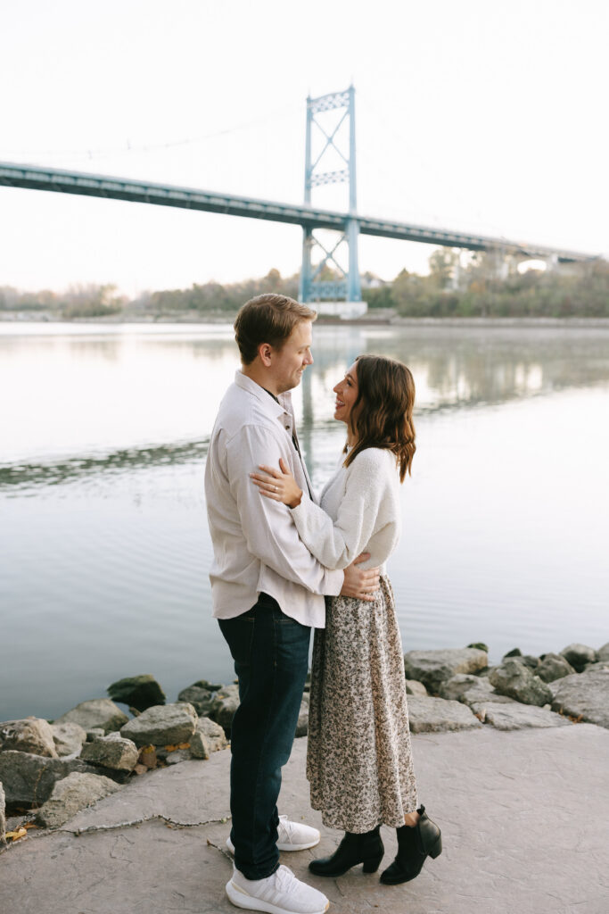 Couple looking at each other during their engagement photos for camera-shy couples.