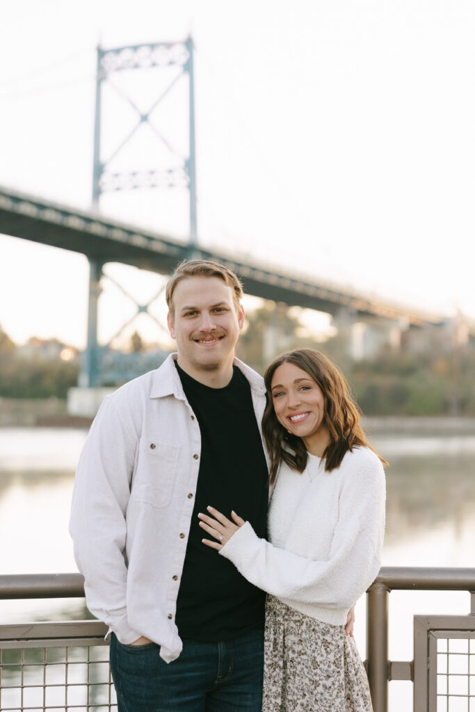Couple looking at the camera during their engagement photos for camera-shy couples.