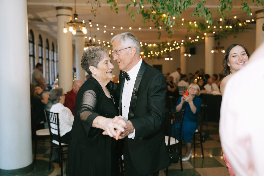 Grandparents on the dance floor taken as a candid wedding photograph