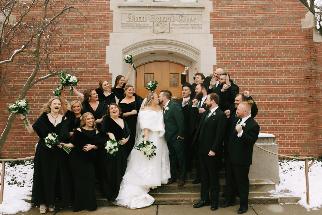 Kirsten and Jeff and their wedding party in front of the Michigan State Alumni Chapel for their Michigan Wedding
